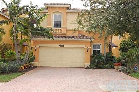 EXTERIOR FRONT WITH OVERSIZED DRIVEWAY