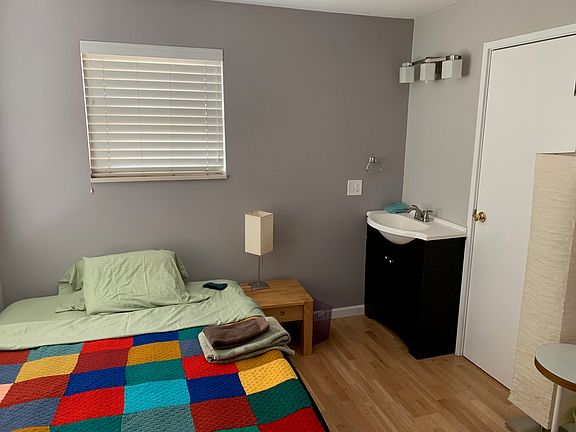 Main bedroom with adjoining bathroom and walk in closet