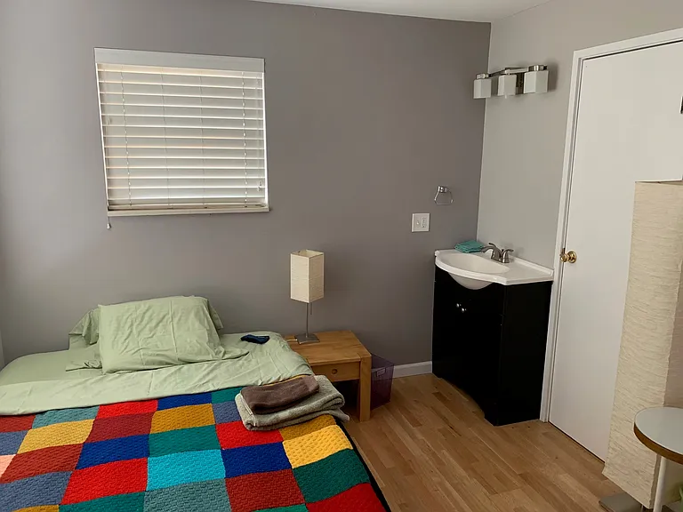 Main bedroom with adjoining bathroom and walk in closet