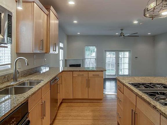 Kitchen includes all appliances: dishwasher, garbage disposal, range, oven, microwave and refrigerator.