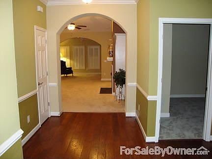 Entry
						:
						Wood flooring, chair rail accents and crown molding.