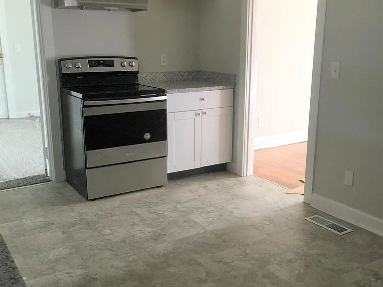 Eat-in Kitchen. Tenant provides refrigerator