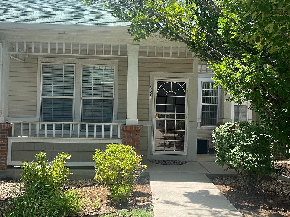 Entry with front porch and lockable storm door (with glass insert for winter or screen for summer).