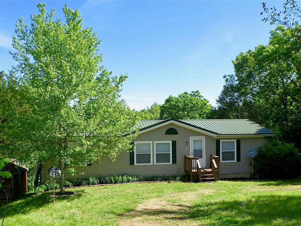 Welcome Home! 11200 Cathy Drive sits on 8.1 acres