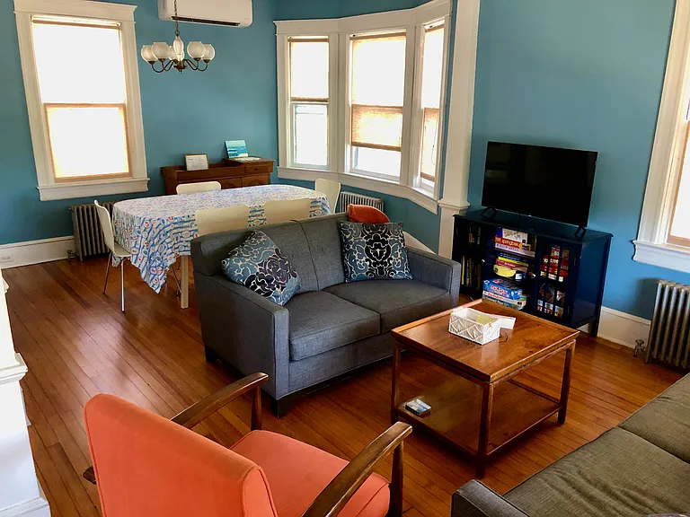 Living room is just right for sitting and conversing. Large variety of games for all ages. 40" Smart TV.