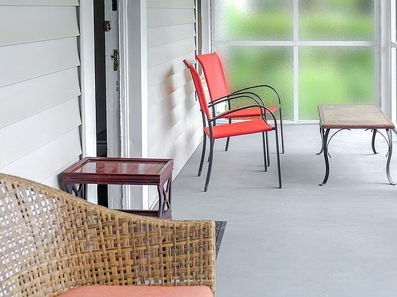 Take a break on the screened in front porch.
