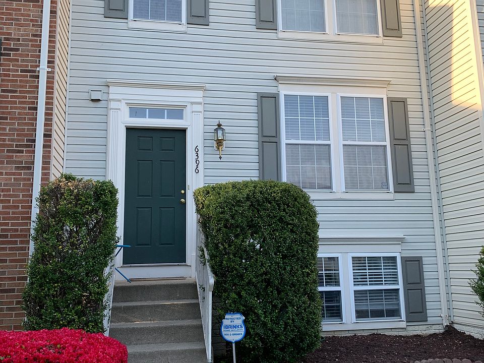 Front of house. Two assigned parking spaces with plenty of visitor parking.