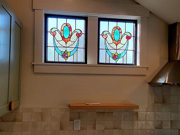 Antique stained glass windows in kitchen.