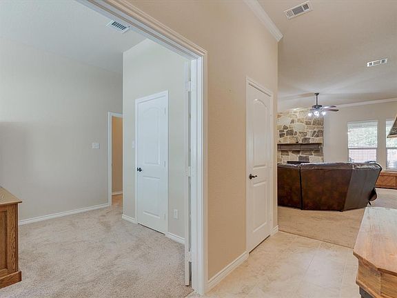Entry with bedroom/study with walk in closet and doors