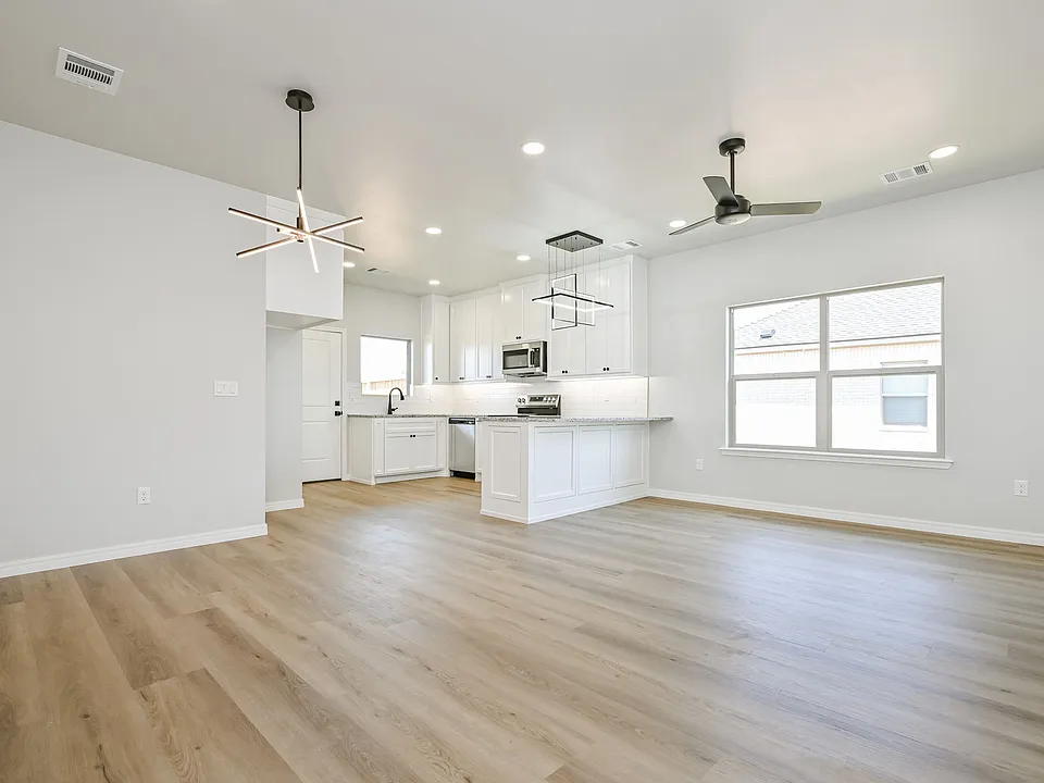 Front entry looking into living and kitchen