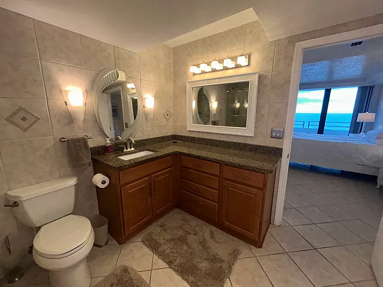 Primary bathroom with granite countertops