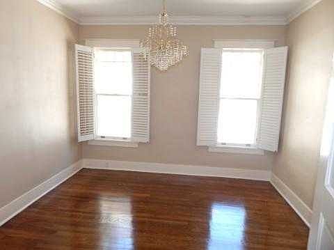 bedroom #2, new paint, refinished floors.