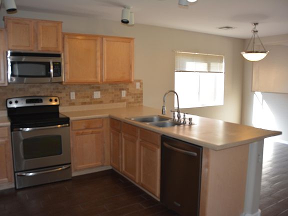 5th image of 11594 W Cinnabar Ave