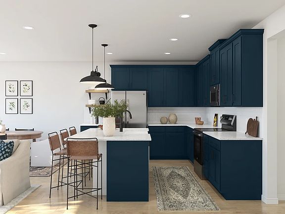 Kitchen with quartz island and countertops