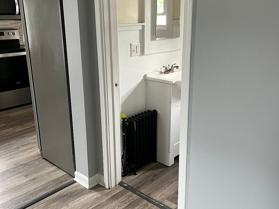 hallway into kitchen