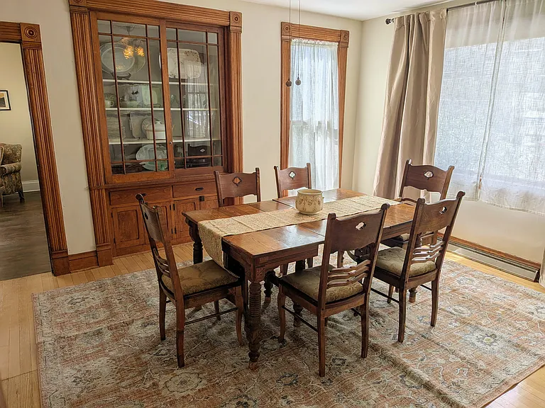 Dining Room has a beautiful build in cabinetry and is located next to the SunRoom / Game Room (also serves as a 4th bedroom)