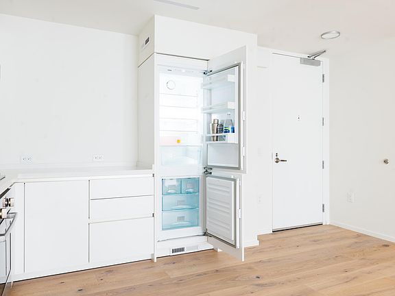 Sleekly integrated Liebherr refrigerator/ freezer.