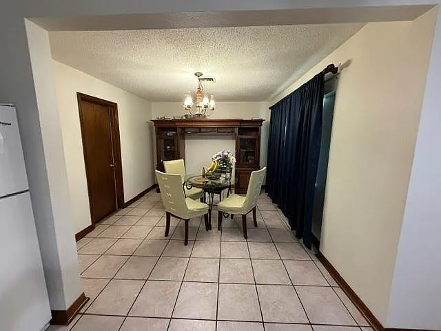 3637 E Loyola Dr — Photo 2