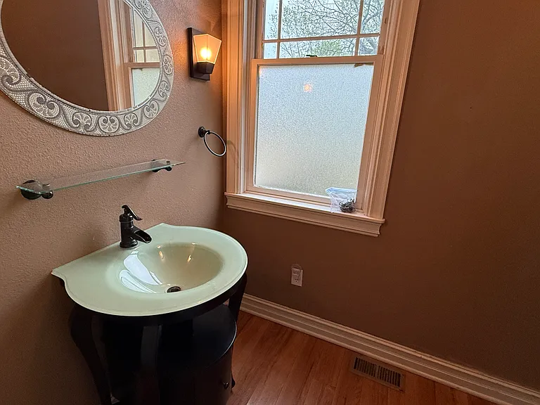 Primary suite bathroom on 1st floor