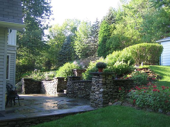 front stone patio and wall