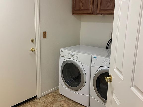 Laundry Room with Washer and Dryer Included