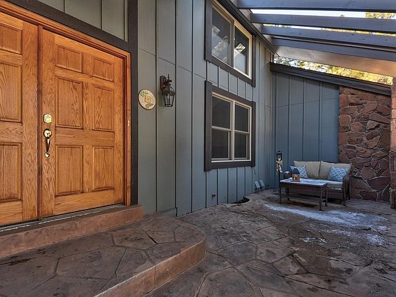 Large front porch area with stamped concrete