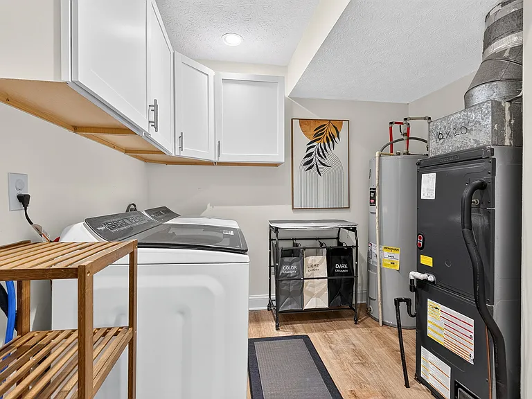 Laundry room with cabinet storage