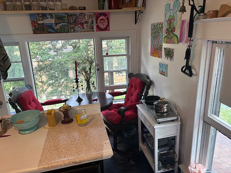 example - kitchen area with small appliances on side table.