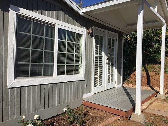 Weather protected front stoop