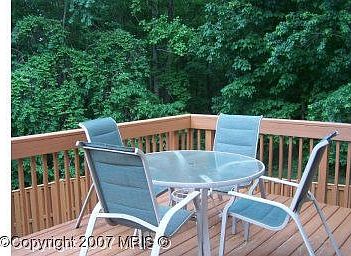 Newly stained deck and fence...Backs to woods!