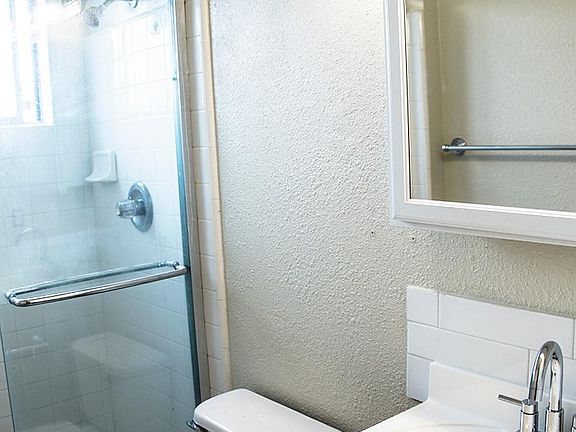 MASTER BEDROOM BATHROOM. One of two bathrooms