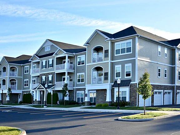 Apartment Building, 3 Floors with Elevator. Private 1-car Apartment Garages Optional per Availability