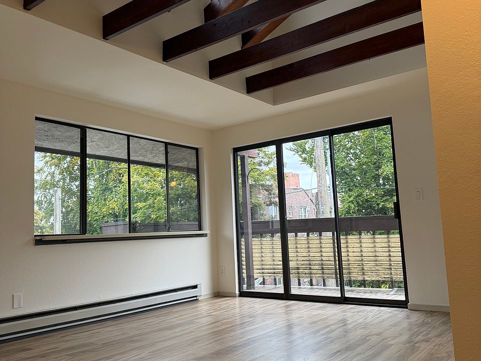 High ceiling with natural lighting in living area.