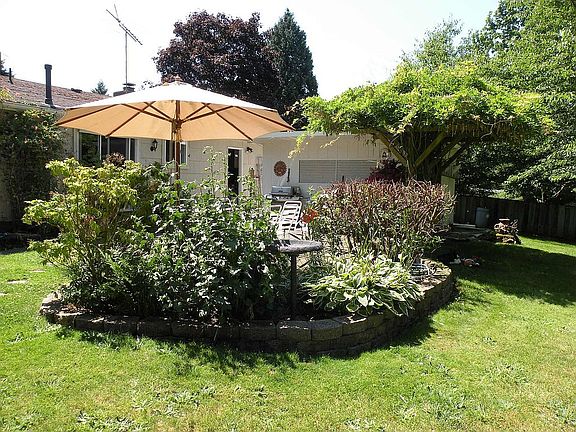 Across the patio towards the house & shop