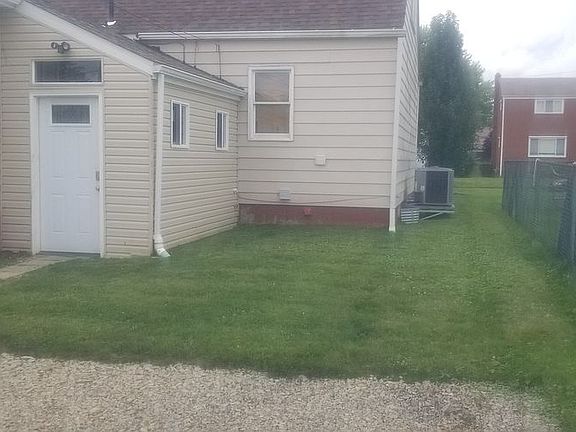 Back of house with entrance