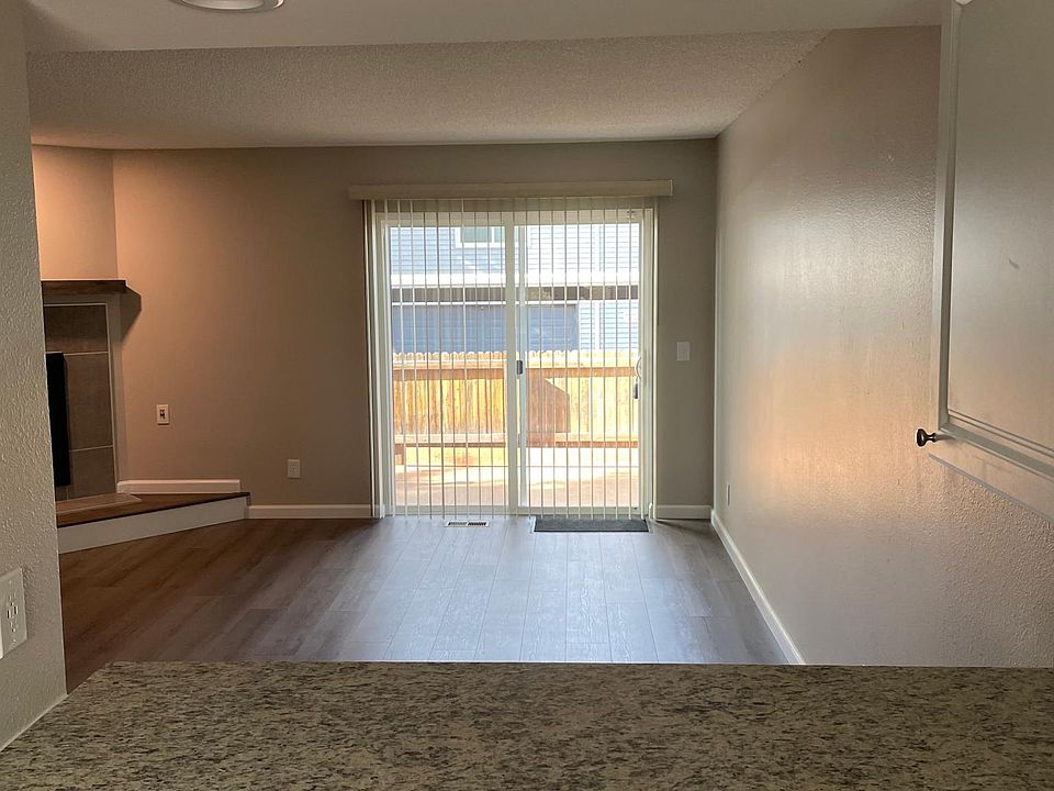 From kitchen thru living room, patio/carport entrance