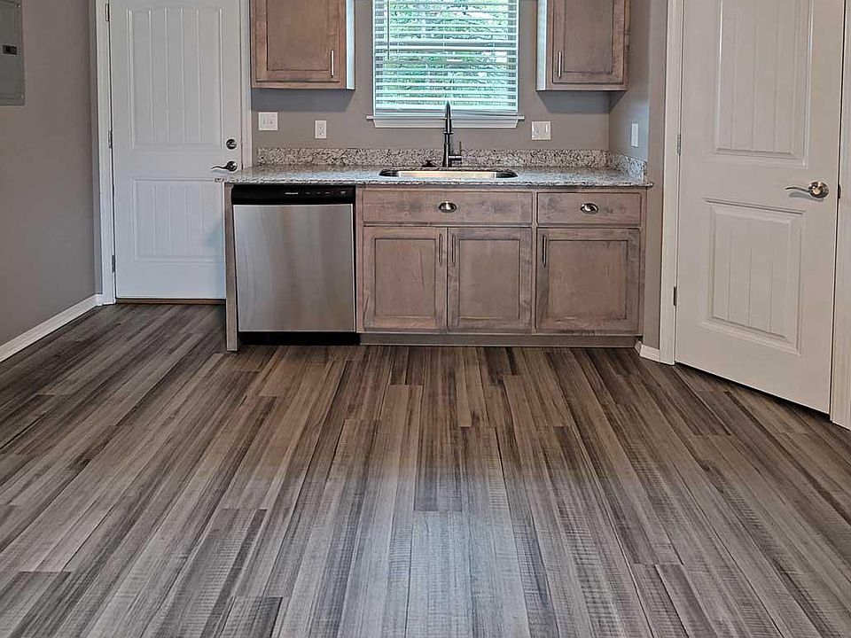 Large kitchen with dishwasher included. Back door has easy access to outside.