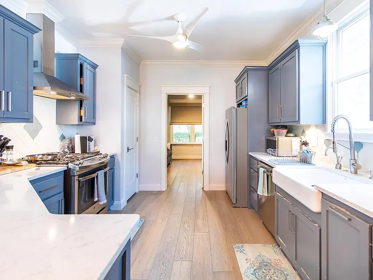 Fully equipped kitchen with hood vent, dishwasher, microwave and full size refrigerator. Everything you need to cook melas and entertain.