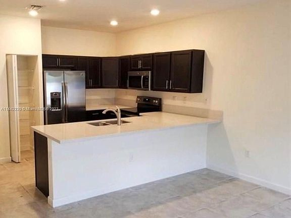 3rd image of 10588 W 33rd Ln #10588