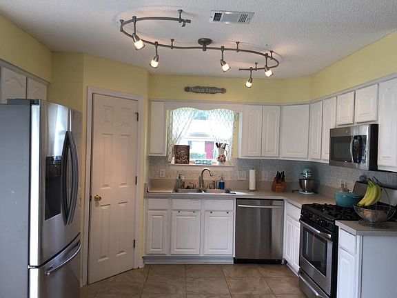 4th image of 9028 Bluebay Ln