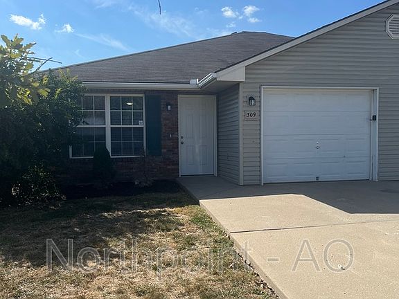2nd image of 311 NW Woodbury Dr