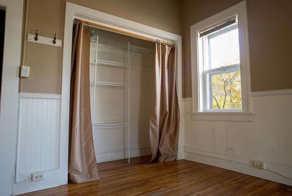 The main living area has a small but tall closet with shelve