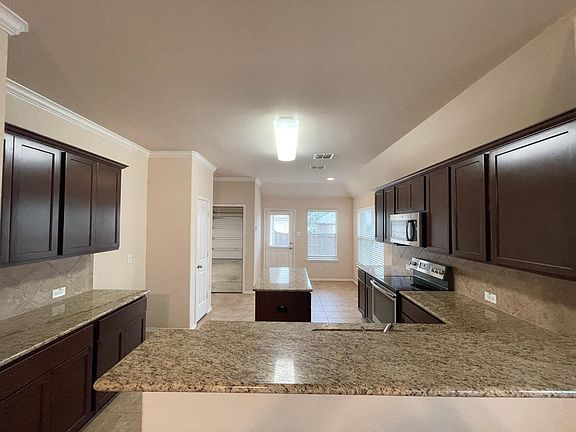 4th image of 8924 Wild Rose Ln