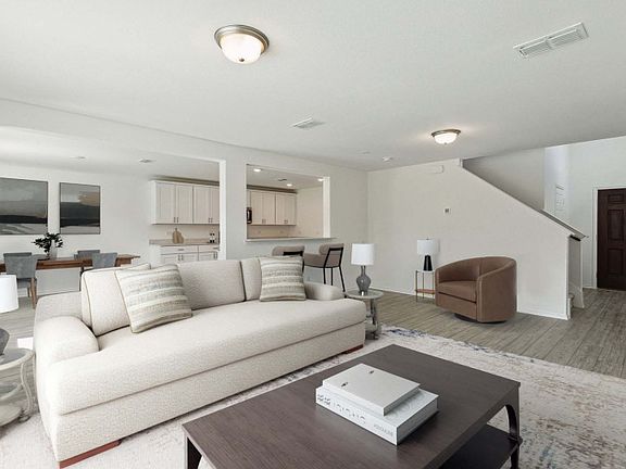 Expansive gathering room bathed in natural sunlight