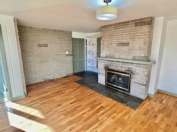 Spacious living room with fireplace