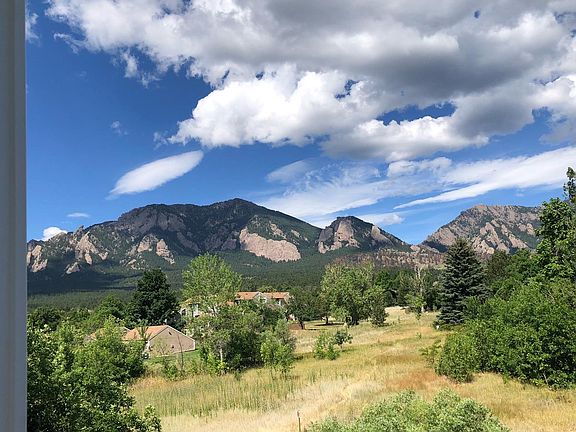 This is the view from the window of the second bedroom. The open space in the foreground is owned by the HOA and will not be developed.