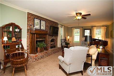 Spacious Den w/ Brick Fireplace