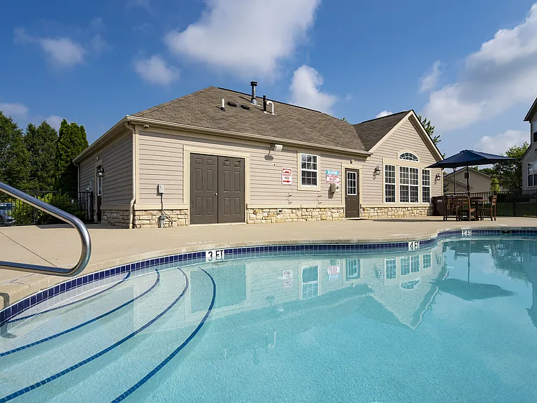 Dive into relaxation and excitement with a sparkling pool and slide, perfect for cooling off and enjoying sunny days.