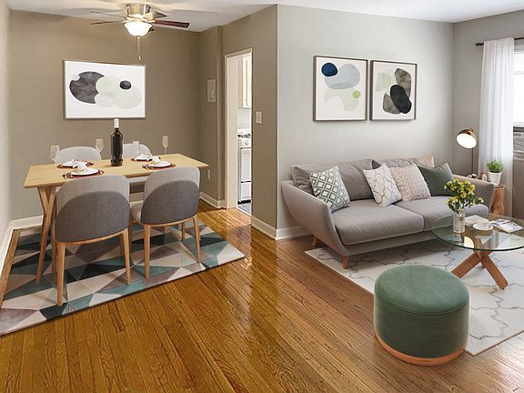 Apartment living and dining area (virtually staged)