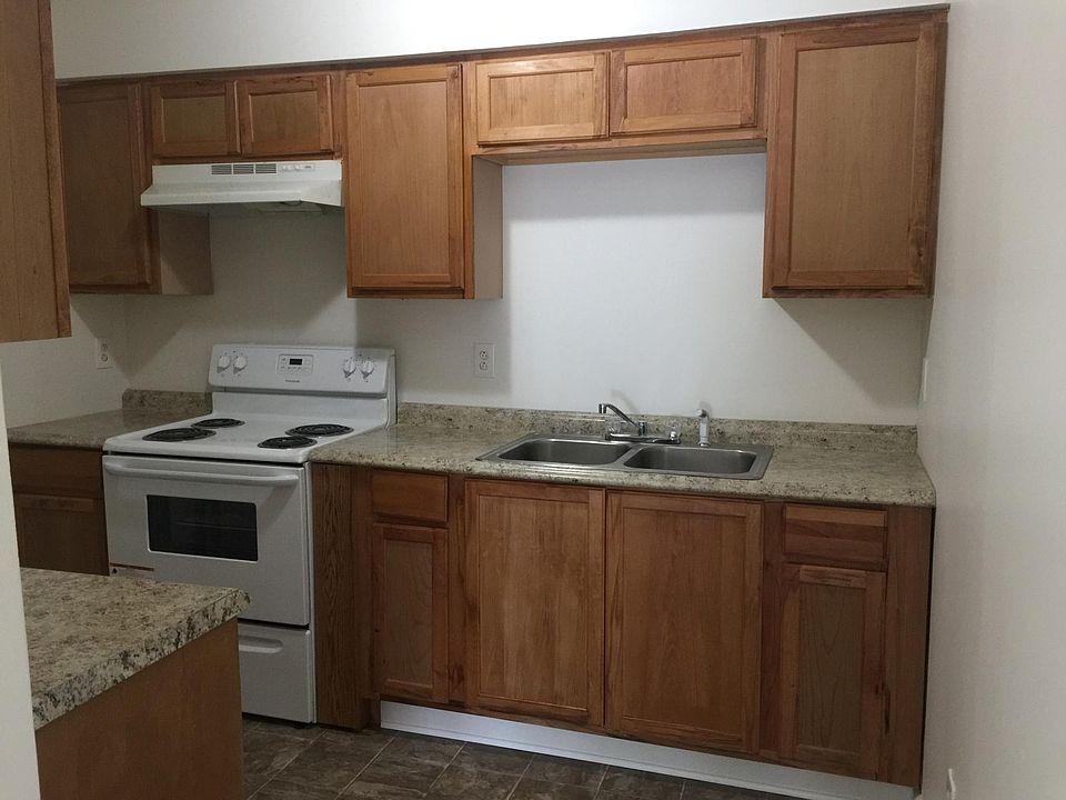 Kitchen; new cabinetry, countertops, paint and flooring.